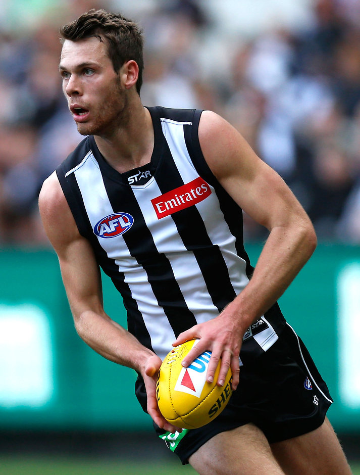 AFL 2015 Rd 23 - Collingwood v Essendon MELBOURNE, AUSTRALIA - SEPTEMBER 6: Matthew Scharenberg of the Magpies in action during the 2015 AFL round 23 match between the Collingwood Magpies and the Essendon Bombers at the Melbourne Cricket Ground, Melbourne, Australia on September 6, 2015. (Photo by Adam Trafford/AFL Media)